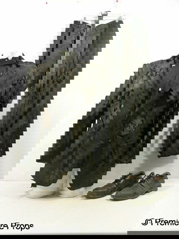 Resident Evil Afterlife Albert Wesker (Shawn Rober: Resident Evil Afterlife - Albert Wesker (Shawn Roberts) screen worn very dirty, burn, and torn, black two button with front pockets, shoulder pads, 'DKNY' suit jacket, (size 42R) dirty and torn black