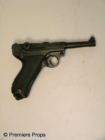 Inglourious Basterds Parabellum Pistol Movie Props: Inglourious Basterds - Screen used, hero, inert, heavy black plastic 1720 P-08 Parabellum pistol (approx. 5" by 8")