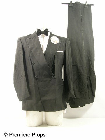 Inglourious Basterds Pfc. Omar Ulmer (Omar Doom) T: Inglourious Basterds - Pfc. Omar Ulmer (Omar Doom) screen worn, hero, bloody, black single breasted tuxedo jacket with white pin on flower, white pocket square, white long sleeve with detachable wing 