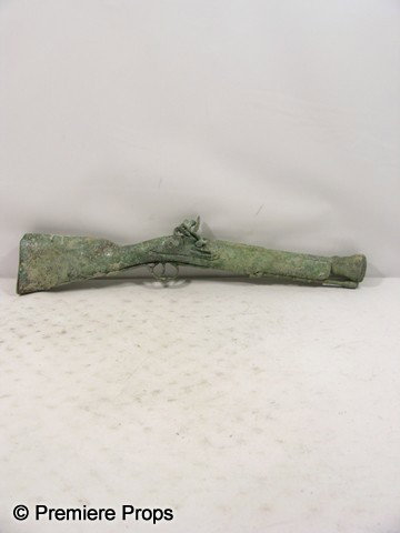 Pirates of the Caribbean Blunderbuss Gun Movie Pro: Pirates of the Caribbean - Sandy and worn, metal muzzle-loading with a short, large caliber barrel flared at the muzzle blunderbuss gun. (approx. 29" long) This is a replica blunderbuss and does not f