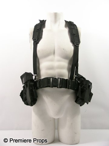 Resident Evil Afterlife Chris (Wentworth Miller) B: Resident Evil Afterlife - Chris Redfield (Wentworth Miller) screen worn, hero, black nylon tactical belt with adjustable shoulder straps and multiple bags with snaps on the belt. ('Chris' written insi