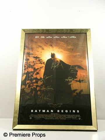 Batman Begins Autographed Movie Poster Movie Props: Batman Begins - From Chris Kattan's personal collection this is a 'Batman Begins' movie poster autographed by the cast and framed in a gold wood and glass frame. (approx. 41" x 29 1/2"). This item is 