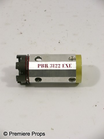 Red Frank (Bruce Willis) Flash Bomb Movie Props: Red - Frank (Bruce Willis) screen used, hero, silver, black, and gold metal 'PBR 3122 EXE' flash bomb. (approx. 4" long)