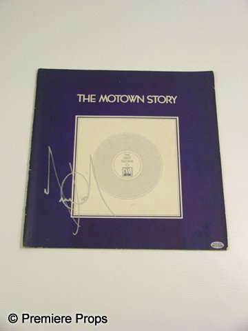 MOTOWN STORY BOOK - Autographed by Michael Jackson: The Motown Story Book - Michael Jackson autographed "The Motown Story Book". Soft covered book hand signed in silver paint pen by Michael Jackson. Book includes special section on Jackson 5 with photo