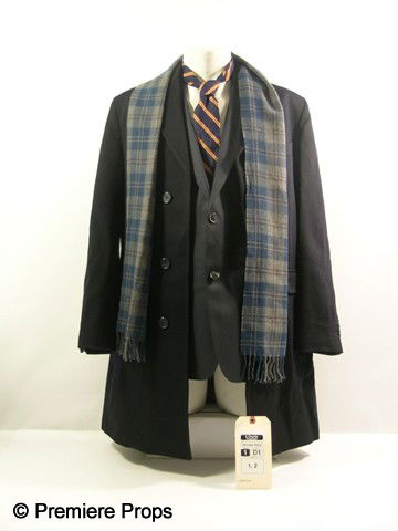 THE ADJUSTMENT BUREAU - Charlie (Michael Kelly) C: The Adjustment Bureau (2011) - Charlie Traynor (Michael Kelly) screen worn, navy cashmere, three button, two flap pockets, one split pocket, covered placket 'Metropolitan View' overcoat, (size 38R) na