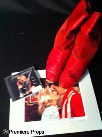 Nancy Sinatra Autographed Boots: Nancy Sinatra Autographed Boots - A pair of red leather boots signed "Nancy" and "Sinatra" on each boot. Also includes an autographed promotional CD for "One More Time" and a replica machine signed lo