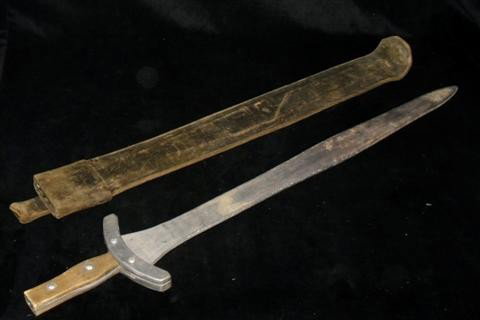 Pirates of the Caribbean: The Curse of the Black P: Pirates of the Caribbean: The Curse of the Black Pearl (2003) - A production used background stunt pirate sword. With metal blade but squared on both sides. 34" x 6". Oversized item. Additional shippi