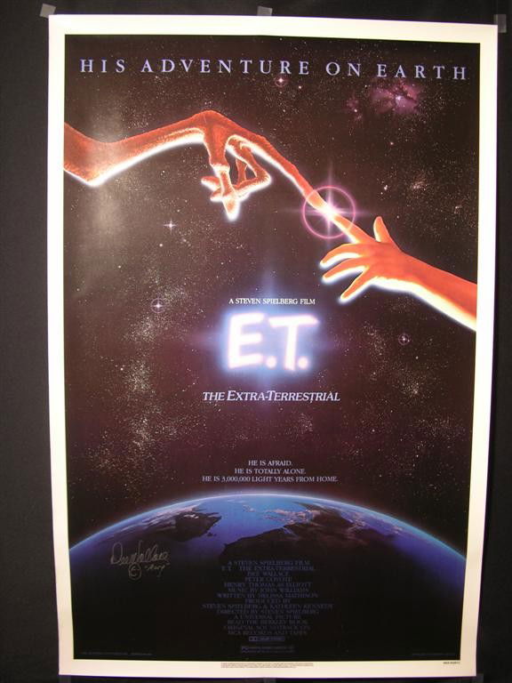 E.T. Signed Poster: Rolled one sheet poster for E.T., signed by co-star Dee Wallace, who adds her character name "Mary" and a happy face. (40x27)