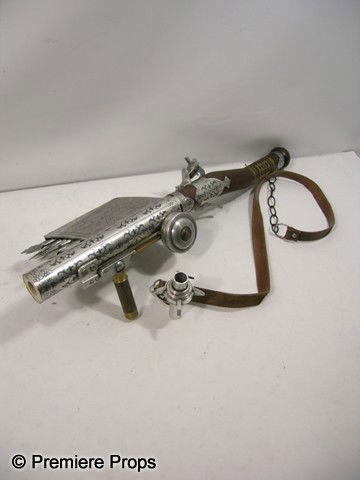 Three Musketeers Prop Grappling Gun: The Three Musketeers (2011) - Screen used grappling gun with arrows on the side. (approx. 28" long)