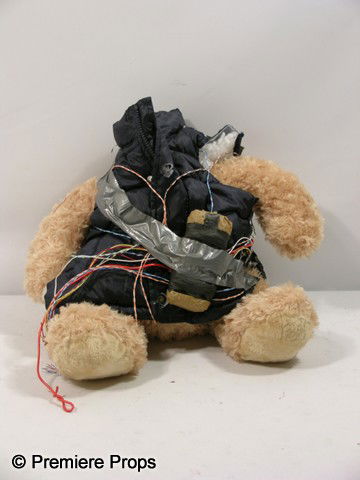 30 Minutes or Less Bomb Rigged Teddy Bear Movie Pr: 30 Minutes or Less (2011) - Hero, screen used, Teddy Bear with custom bomb rigging on the front and head blown off. (approx. 12" x 12") Oversized item. Additional postage required.