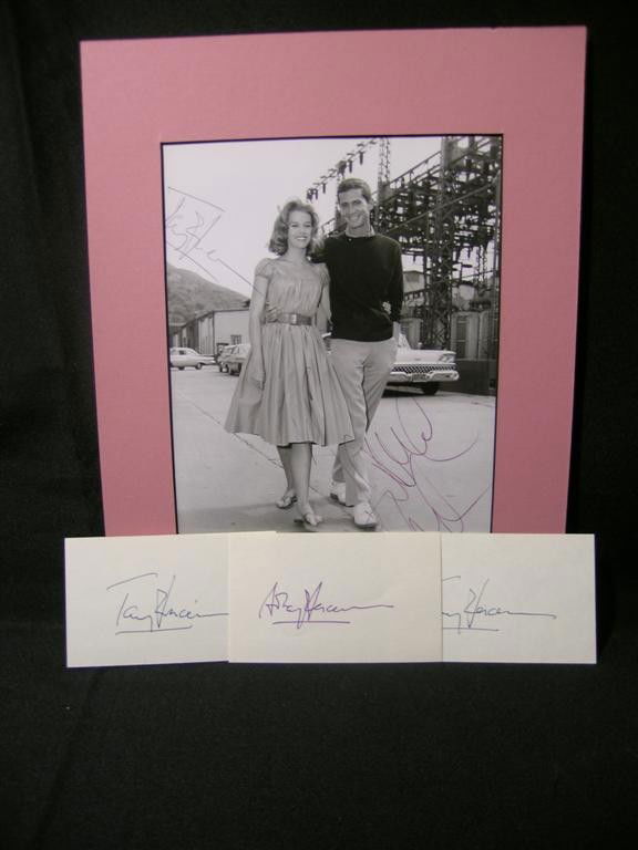 Anthony Perkins and Jane Fonda Autographs: Matted photo of actors Anthony Perkins, most famous as Norman Bates of Alfred Hitchcock's Psycho (1960), and Jane Fonda. The photo is black and white, measuring 8 x 10 and was taken in the late 1950s.