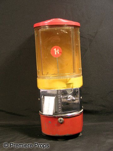 Back To the Future Gumball Machine Movie Props: Gumball machine used in the Old Hill Valley sequence of Back To the Future (1985). In these scenes, Marty (Michael J. Fox) travels back to the 1950s, where he meets a young version of his own father,