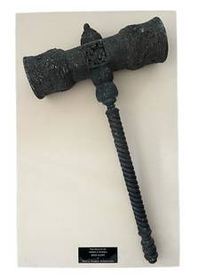 Mortal Kombat Annihilation Emporer of Outworld War Mallet Movie Props: Screen used War mallet of the Emperor of Outworld - Shao Kahn in Mortal Kombat Annihilation. Mounted on cloth backing with plaque that reads: "War mallet of the Emperor of Outworld in Mortal