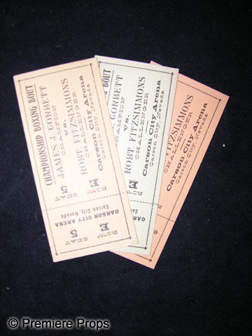 Three Prop Tickets from Gentleman Jim: Three prop tickets of orange, green and gold colors, used in the production of Errol Flynn's Gentleman Jim (1942). The film found Flynn playing champion boxer James J. Corbett, whose revolutionary tec
