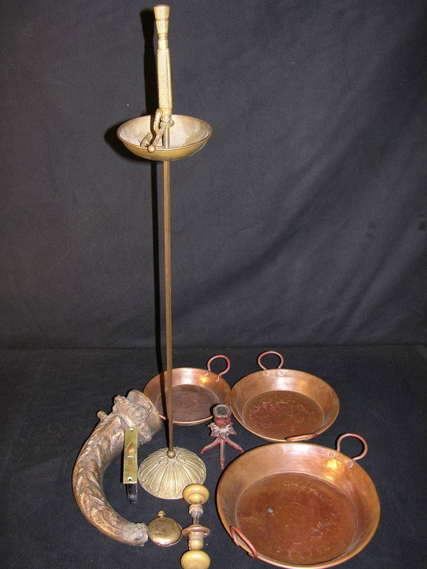 Lot of Props from The Addams Family: Miscellaneous props collected by a technician who worked on the original Addams Family television series in the 1960s. These include doorknobs, a set of three metallic plates seen in background scener