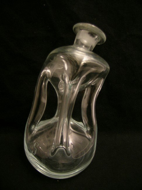 Screen Used Bottle from Star Trek: The Original Series: Uniquely shaped glass bottle used in the Star Trek: The Original Series story By Any Other Name, the 51st episode of Gene Roddenberry's groundbreaking show. This episode involved aliens called Kelvins