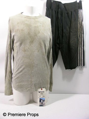 Warrior Tom (Tom Hardy) Movie Costumes: Warrior - Tom (Tom Hardy) screen worn, very worn, long sleeve 'Gap' shirt, (size M) very worn, white ribbed 'Hanes' tank top, (size L) and worn and faded black with white stripes 'Adidas' cut off pant
