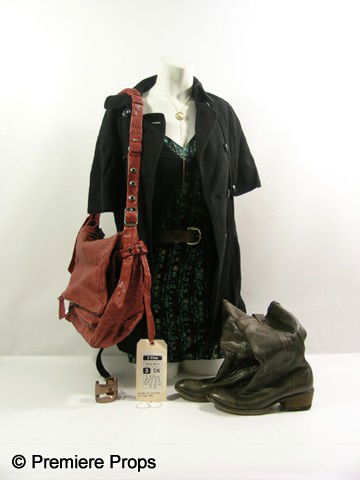 The Adjustment Bureau Elise (Emily Blunt) Movie Costumes: The Adjustment Bureau - Elise Sellas (Emily Blunt) screen worn, grey peacoat, cardigan sweater, necklace, brown leather belt, floral print dress, brown large purse, and brown leather boots. Includes w