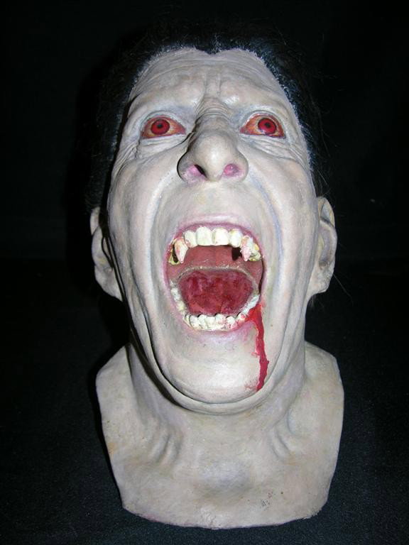 Christopher Lee As Dracula Bust: Christopher Lee as Dracula original bust, being a fine work of art by Henry Alvarez. These were produced in a series, based upon a famous still of Lee in the film Dracula AD 1972, wherein he is impale
