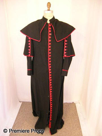 Lot of Religious Garments: Lot of 9 religious garments, 2 Cardinal coats, 1 black, 1 white, 7 white Choir Boy tops.