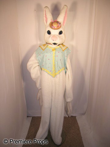 Cute Bunny with Hat Mascot Costume: Professional Mascot style "Cute Bunny with Hat." Bunny comes with head, body and mitts - NO FEET. Many bunnies come with vest or aprons. Colors and styles of these vests and aprons will vary with each