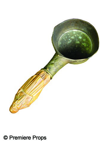 Pirates of the Caribbean: At World's End Prop: Metal pan with wooden Chinese figure forming the handle, used in the background of pirate crime lord Sao Feng's lair in Pirates of the Caribbean: At World's End (2007). (11.5x4x3.5)