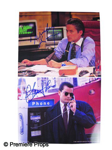 Wall Street Signed Michael Douglas and Charlie She: Two color lobbycards from Wall Street (1987), one signed by Michael Douglas and the other signed by Charlie Sheen. (8x10 each)
