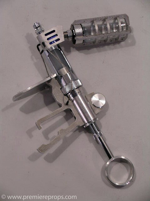 Underworld Michael's (Scott Speedman) Injection Gu: Underworld (2003) - Michael's (Scott Speedman) Serum Injection Gun Prop (9.5" x 8" x 2"). Made from aluminum and metal with glass components. The plunger pushes the serum through the tip. The serum vi