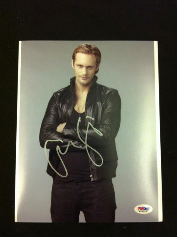 True Blood Photo Signed by Alexander Skarsgard: 8 x 10 color photo of actor Alexander Skarsgard in True Blood, signed by the actor in silver ink. A certificate of authenticity is included.