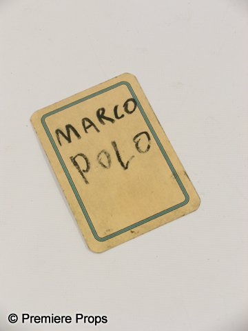 Inglourious Basterds Prop playing card 'Marco Polo: Screen used Tan playing card from Quentin Tarantino's 'Inglourious Basterds.' From the French Café/basement scene, the card measures approx. 3 3/4" x 2 3/4" and has 'Marco Polo' written on the back.