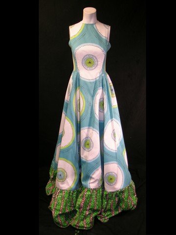 Mirror Mirror Full Length Flower Dress & Bustle: This full length dress is from the 2012 fantasy film Mirror Mirror, starring Julia Roberts. This blue and white dress is designed with a beautiful circular pattern that tapers into a green hemline. Al