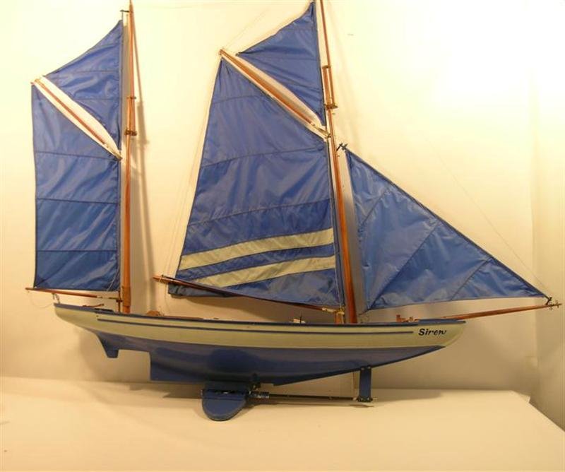 Stuart Little Miniature Remote Control Boat: Stuart Little (1999) - A highly detailed miniature model of a boat used in the famous finale boat race scene that takes place in central park. The boat is wired with electronics. It may possibly be co
