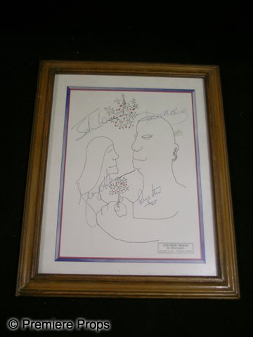 John Lennon Framed Drawing: Lithograph Drawing by John Lennon framed in a wood frame and autographed on the front. (approx. 16" x 13 1/4")