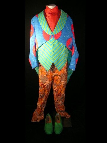 Mirror Mirror Chubby Man Costume: Mirror Mirror (2012) -This is the complete Chubby Man's costume used during the Evil Queen's (Julia Roberts) wedding scene. This colorful wardrobe Includes orange floral designed pants and suspenders,