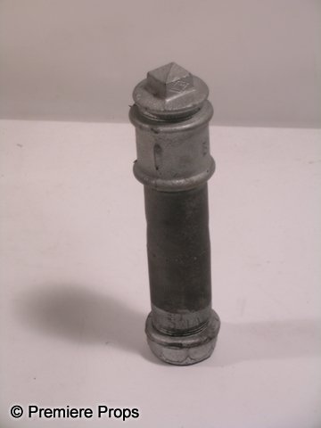 Land Of Blood & Honey Pipe Bomb Prop: From the 2011 war drama 'In the Land of Blood and Honey,' this is a screen used, hero, rubber pipe bomb. The prop is made from soft foam rubber and painted silver to resemble steel. (measures approx. 