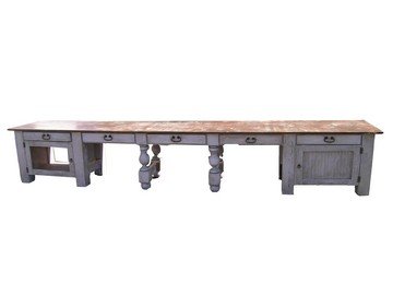 Mirror Mirror Screen Used Long Table & Drawers: From 2012's Mirror Mirror, this brown wood table measures approx. 16' x 2' 5" x 2' 8" long and consists of 5 drawers with two big end cabinets. A magnificent prop.