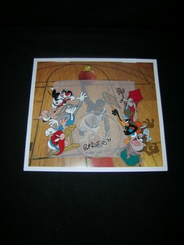Space Jam Looney Tunes / Patrick Ewing Print: A Warner Bros./Looney Tunes animation cel from 'Space Jam' overlapping a photo of retired NBA star Patrick Ewing giving the appearance of Patrick dunking on the group. The print is autographed by Patr