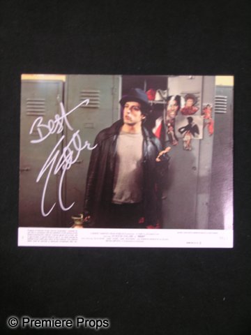 Sylvester Stallone Signed Photo: From his groundbreaking role as Rocky Balboa, this is a Sylvester Stallone signed color photo from his most popular role, 'Rocky.' The photo is a still from the film and is signed in silver felt ink. 