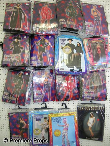 Lot of Assorted Retail Costumes: Lot of assorted women's retail costumes including: 1 saucy witch, 2 women's silver and white Charleston dresses, 2 rock star bustiers, 1 cinema secrets, 2 PVC sexy nun, 1 PVC saucy WPC, 1 sexy devil c
