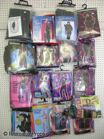 Lot of Assorted Retail Costumes: Lot of assorted mens and womens retail costumes including: Catwoman, womens sexy nun, flower power, rock star bustier, feathered sexy witch, hooded spider cape, Van Helsing, Batsuit Man, sexy witch, r