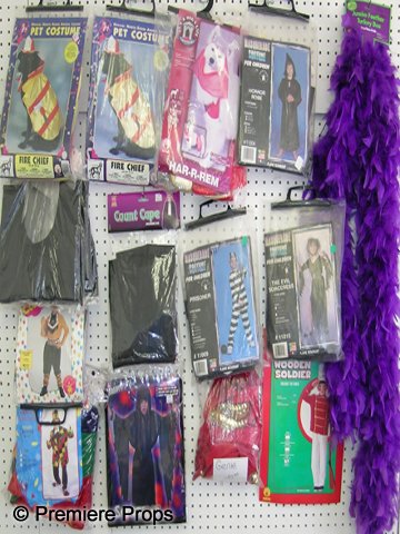 Lot of Assorted Retail Costumes: Lot of assorted retail costumes and accessories including: 10 feathered boas, 9 pet costumes, assorted childrens and adult costumes.