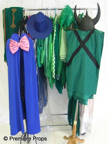 Lot of "Wizard of Oz" Costumes: Great "Wizard of Oz" lot including; 1 Dorothy, 1 Glinda, 5 Jitterbugs, 3 Lollipop Kids, 1 Coroner, 15 Guard pants, 8 Guard vests, 9 skirts, 2 suits, 1 dress and 15 misc. Emerald City pieces.