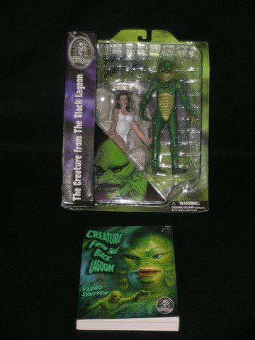 Signed Creature From The Black Lagoon Lot: This is a lot from the classic horror film "Creature of the Black Lagoon" featuring a sealed action figure set of Julie Adams' bathing beauty character Kay Lawrence in swimsuit signed by Ms. Adams her
