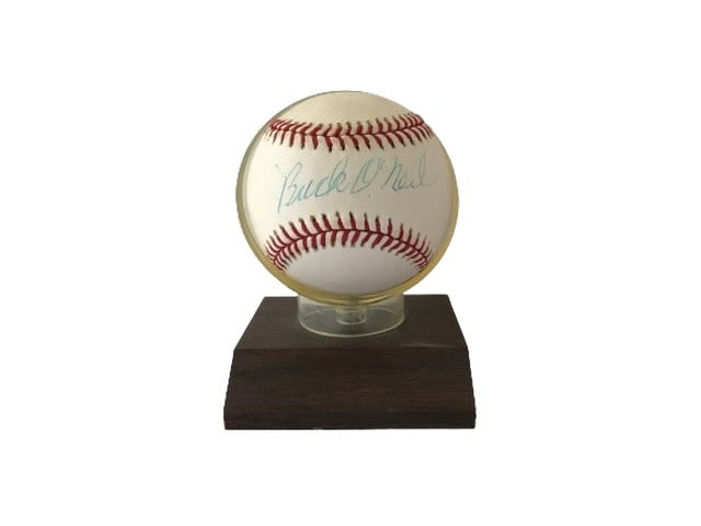 Buck O’Neil Mounted Baseball Signed: Buck O’Neil autographed baseball mounted on acrylic case and wooden base. John Jordan "Buck" O'Neil Jr. was an American first baseman and manager in the Negro American League, mostly with the Kansas
