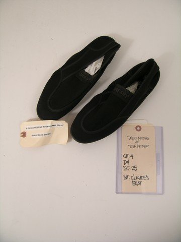 Along Came Polly Lisa (Debra Messing) Costume: From the romantic comedy 'Along Came Polly" (2004), these are Lisa Kramer's (Debra Messing) Surf Boat shoes.
