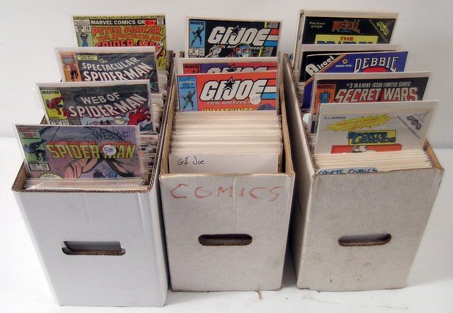 GI-Joe/Spiderman & Assorted Comic Book Collection: Rock Comics, GI Joe, Web of Spiderman, The Spectacular Spiderman, Peter Parker, and assorted sports comics and assorted comics including Sports Legends, Secret Wars, and Debbie Does Dallas. Oversized 