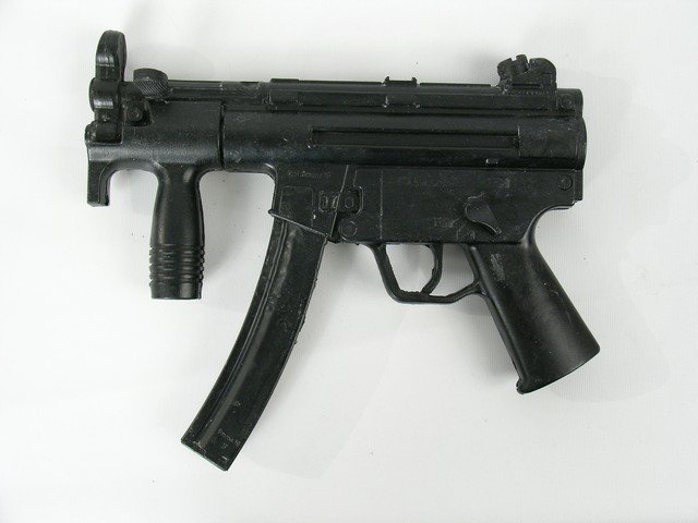 Resident Evil Afterlife Alice (Milla Jovovich) Marched: From the harrowing fast-passed "Resident Evil: Afterlife" (2010), this is Alice's (Milla Jovovich) stunt Heckler & Koch MP5K that is thrown to her by Claire (Ali Larter), when the Survivors are fighti