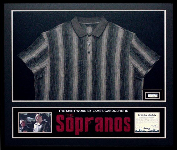 The Sopranos Tony Soprano (James Gandolfini) Framed: This professionally framed black and tan vertical speckle pattern shirt by Axis was worn by the character Tony Soprano portrayed by actor James Gandolfini in H.B.O.'s award winning series "The Soprano