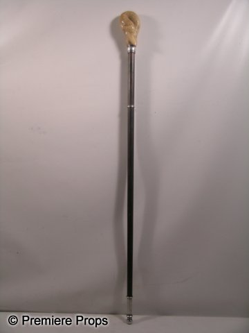 The Three Musketeers Porthos (Ray Stevenson) Cane: The Three Musketeers - Porthos (Ray Stevenson) screen used, brown wood with cream plastic carved duck on the top, custom made cane with metal bottom. (approx. 45" long). Oversized item. Additional pos
