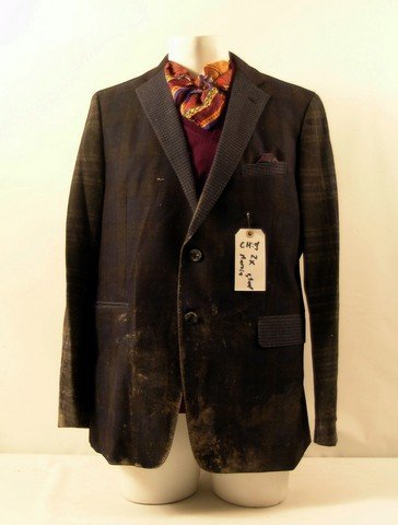 Red 2 Marvin (John Malkovich) Costume: Red 2 - Marvin (John Malkovich) stunt, very worn with mud, dark green and blue plaid two button 'Etro 43' jacket, violet v-neck 'Paul Smith' sweater, (size L) multi color scarf, and worn purple paisle